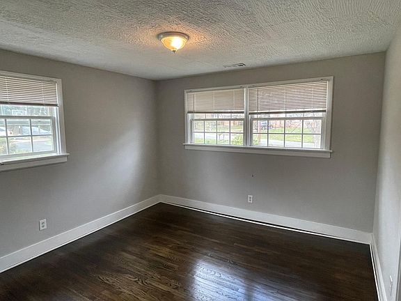Bedroom 2 with hardwood floors