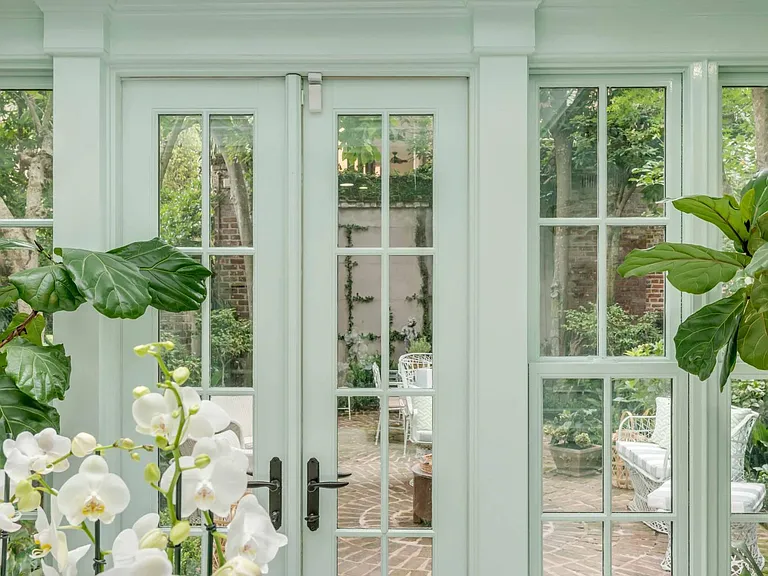 View from sunroom to garden.