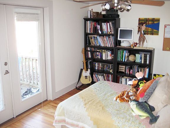 Back bedroom with french doors and walk-in closet