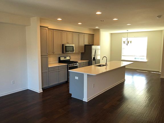 Extra large island with quartz countertops