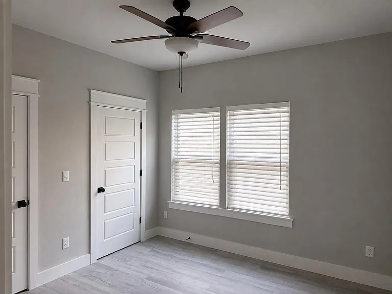 Guest bedroom with two large closets