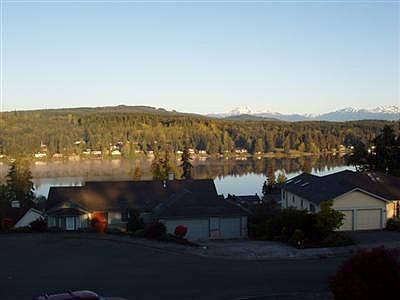 View of lake and mountain from all front of house.