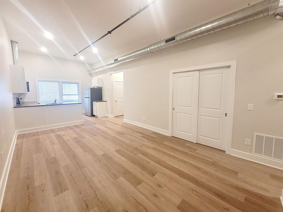 Living/sleeping area with oversized storage closet access