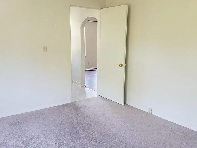 Bedroom looking into living room