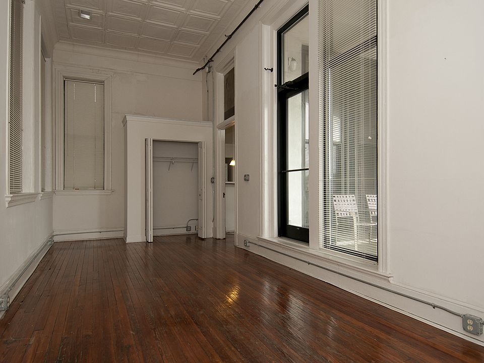 Living Room with Wood Flooring and Balcony