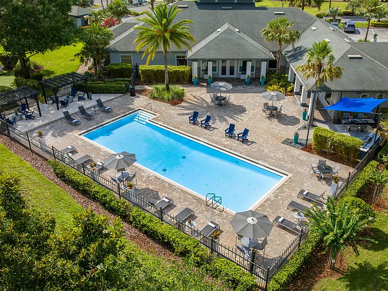 Take in the full layout of Elevate 155's beautifully designed pool deckfeaturing shaded pergolas, cozy hammocks, and plenty of lounge space to unwind.