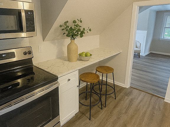 Kitchen includes new no-slam cabinets, new countertops, appliances and an eat-in breakfast bar
