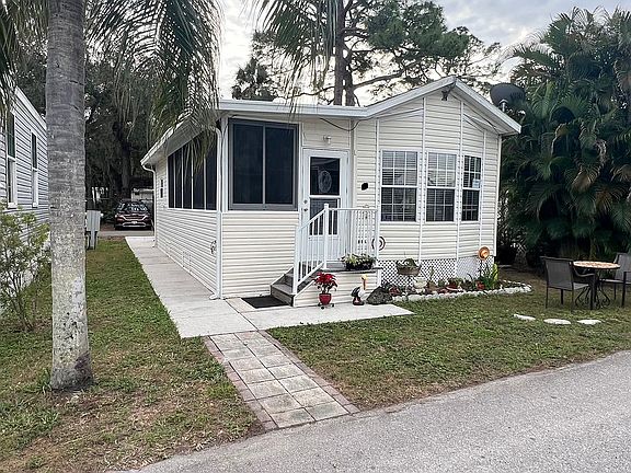2nd image of 11401 Bonita Beach Rd SE Lot 54
