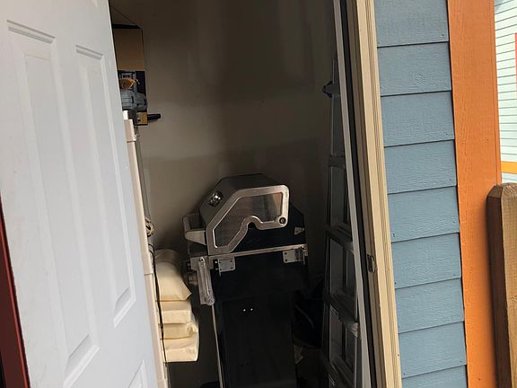 Patio storage is large enough for a grill and misc storage (shelving racks included)