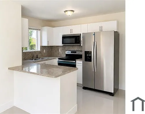 4491 NW 23rd Ave — Photo 3