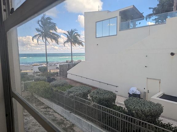 View from inside the apartment to the beach.