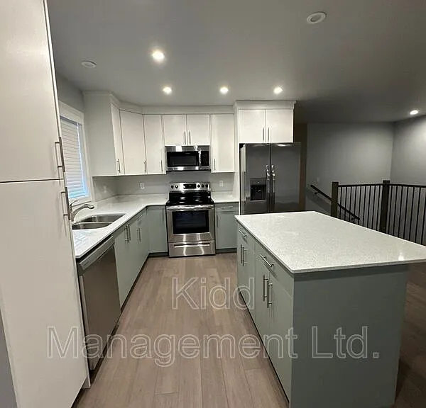 6936 Langer Cres #A — Photo 2