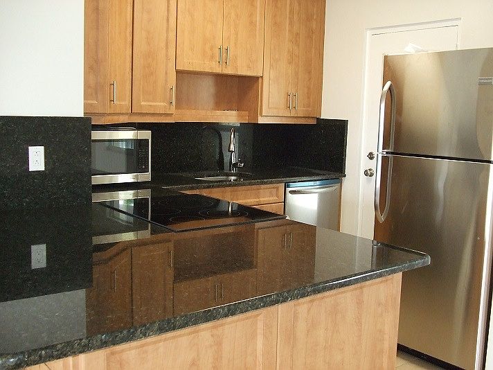 New Kitchen with granite and stainless steel appliances