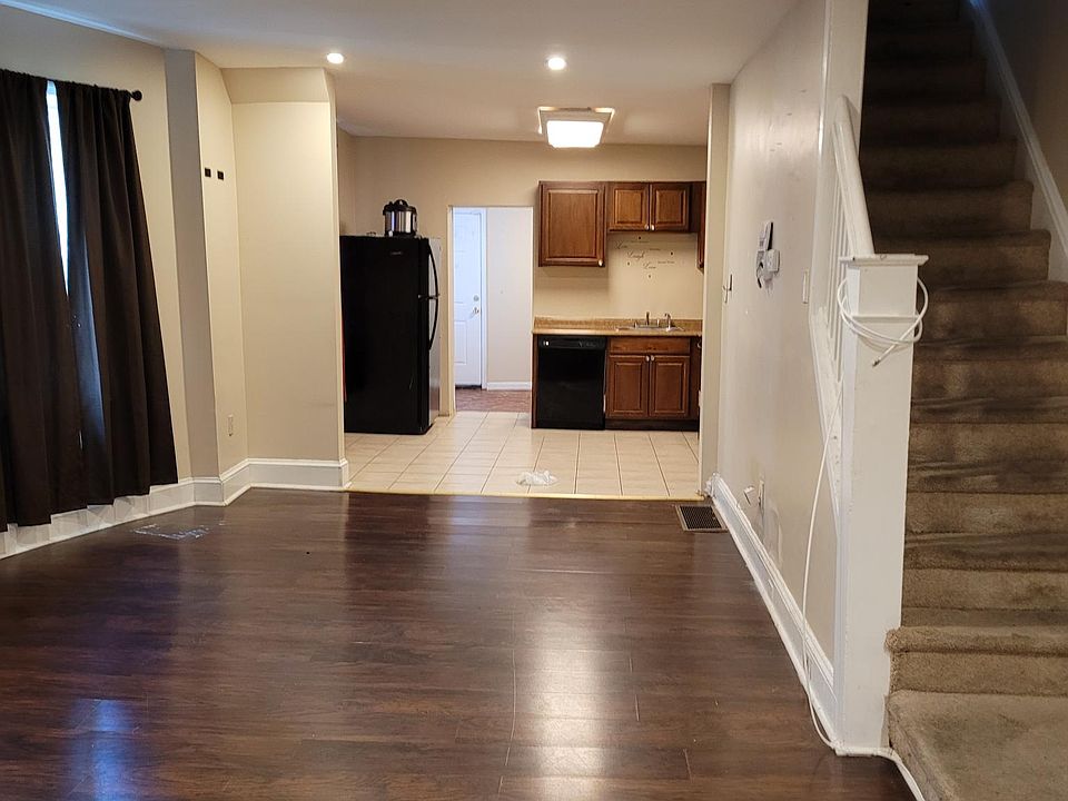 Living room through to dining room and kitchen