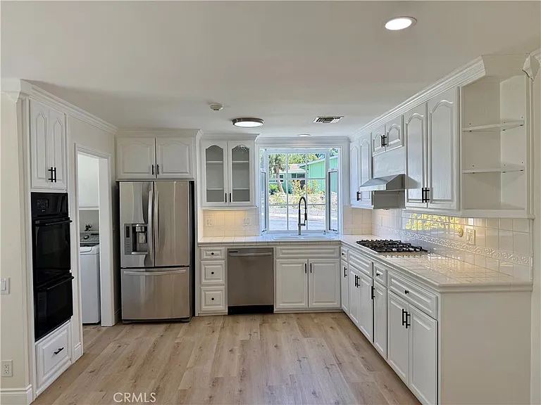 7055 Semrad Rd — Photo 10