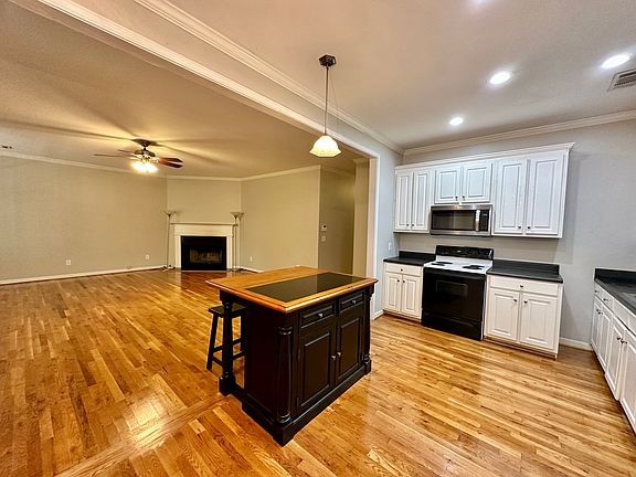 A new kitchen island with many drawers for storage ofcooking utensils