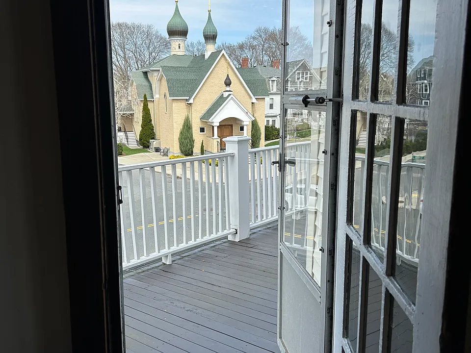 Front porch, off entry foyer.
