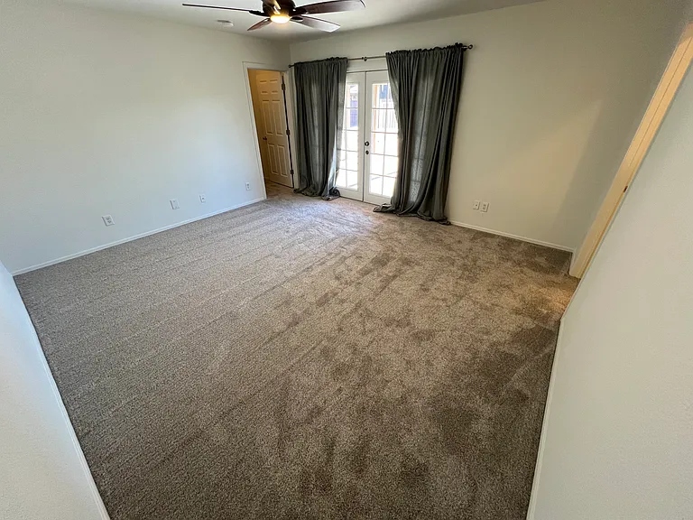 Primary bedroom. New carpet.