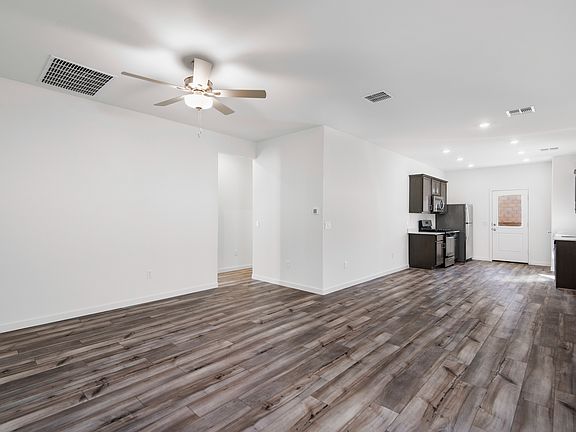 The family room has enough space to gather all friends and family.