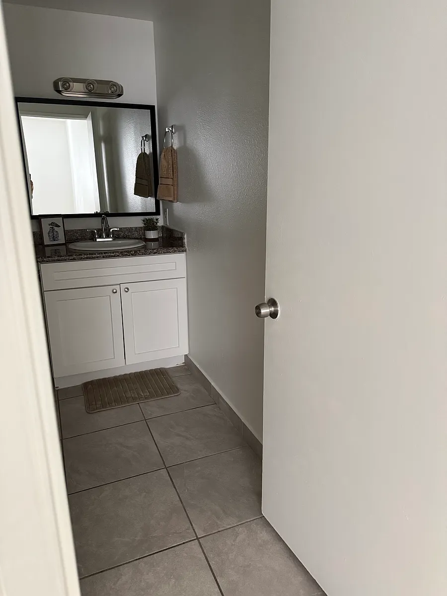 Building Photo - 12713 Branford St #207