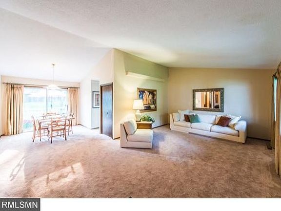 Light and bright with vaulted ceiling in living room and dining room. New carpet throughout entire m