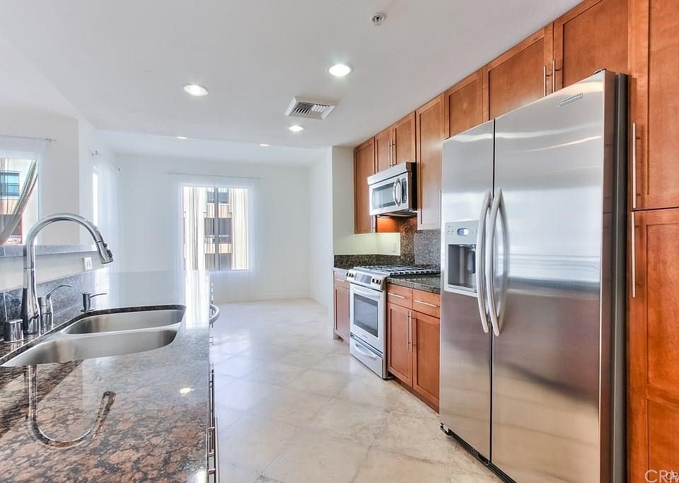 1st image of 300 E 4th St Unit 203