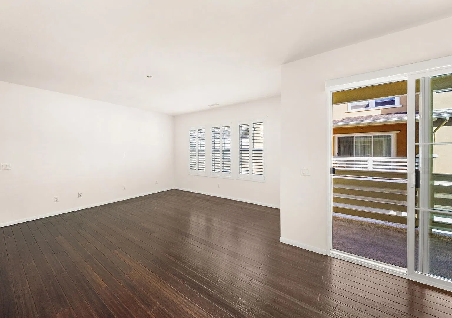1,330-square-foot townhome offers 2 bedrooms, 2.5 bathrooms, and a 2-car direct-access garage — Photo 4