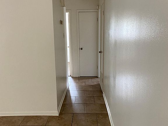 Hallway to bedrooms and bathrooms
