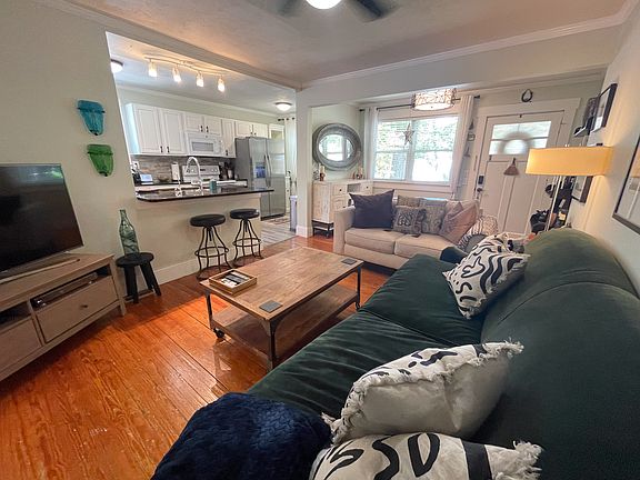 Living Room - Cozy sofa, large TV