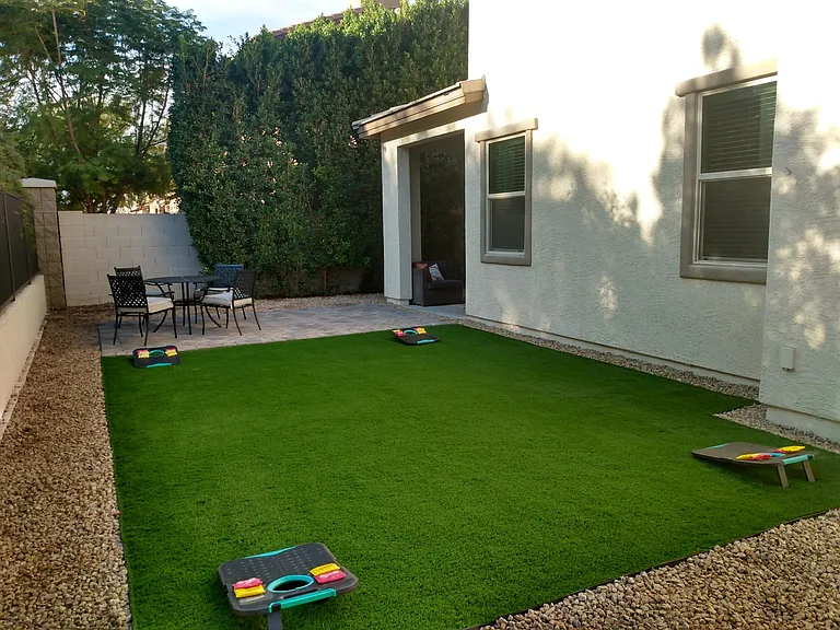 Extended patio modern grey pavers. Backing to an evergreen trees and lawn! Very quiet, no traffic, no neighbors behind.