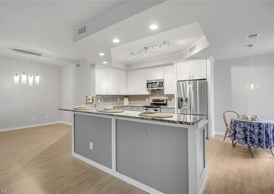 1st image of 7048 Pelican Bay Blvd APT 204