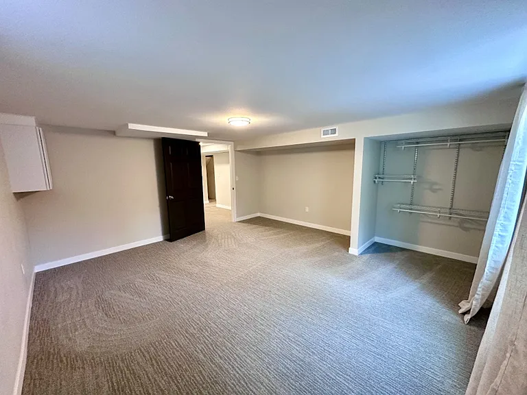 Downstairs bedroom. NW Corner.