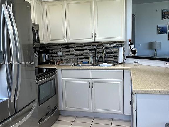 5th image of 10140 W Bay Harbor Dr APT 402