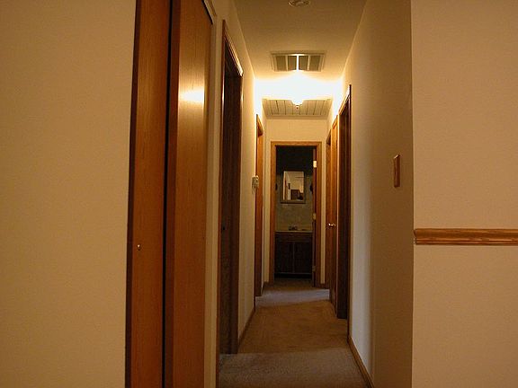 Hallway to shared bath