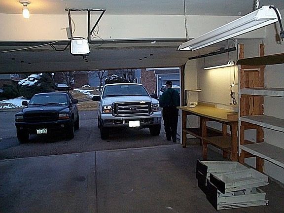 Garage holds Ford Excursion