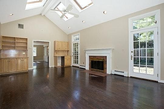 ...with fireplace, wet bar, & access to patio/yard.