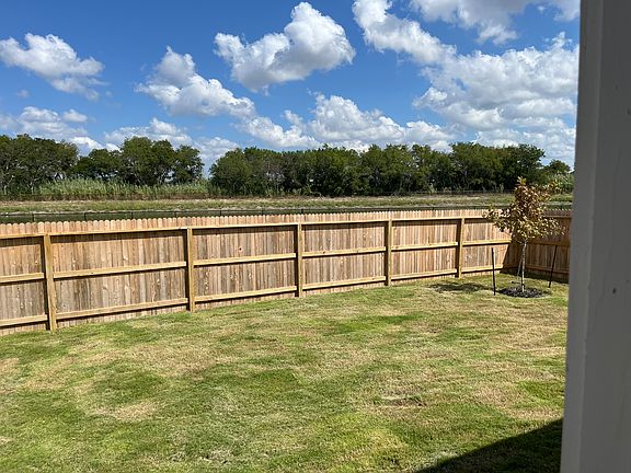 Out the back door to the backyard.