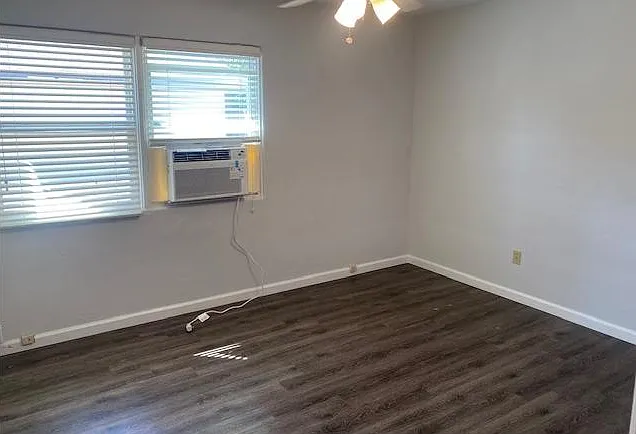 Bedrooms each have a ceiling fan. We've added window AC to supplement the split AC located in the living room