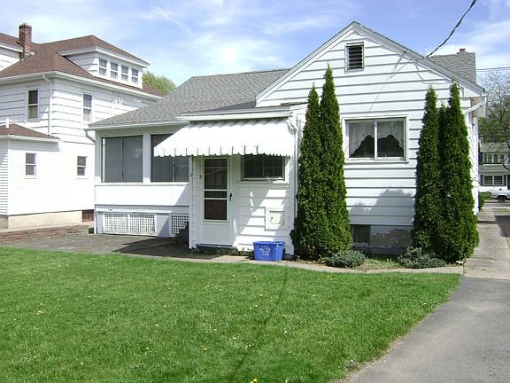 rear of home w/covered porch