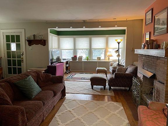 View of living room, front room and front door
