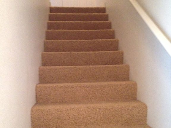 2nd stairs that leads to bedroom, washer and dryer and bathr