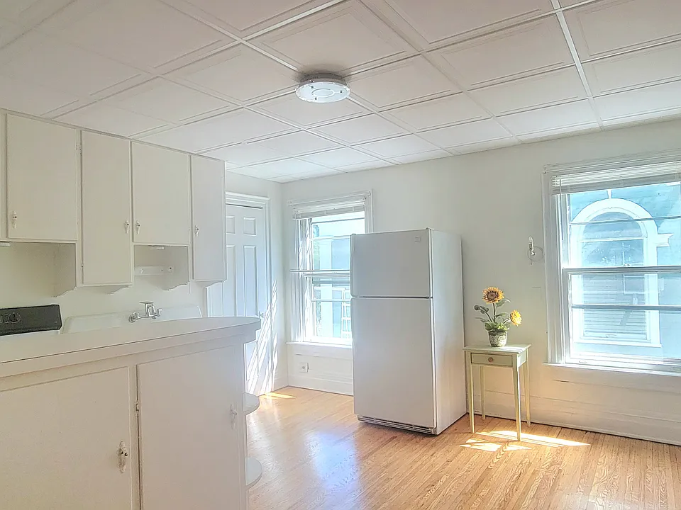 Huge eat-in kitchen with pantry! And a full size refrigerator and gas stove.