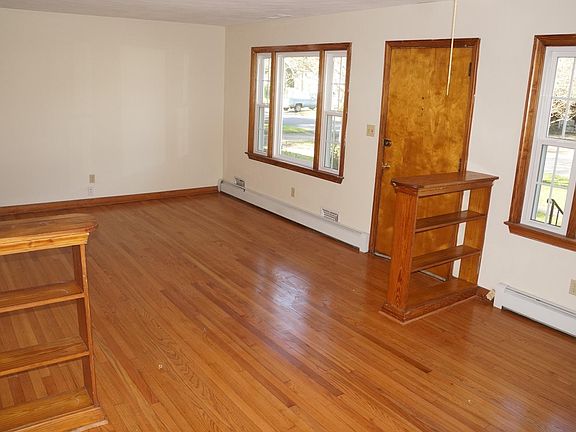 Living Room seen from Dining room; beautiful oak floors.