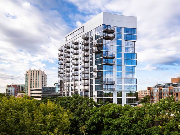 2 Outdoor View of Apartment and Tree Line