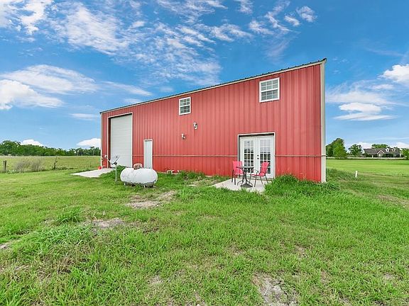 Back of Barndominium w/ French doors from master