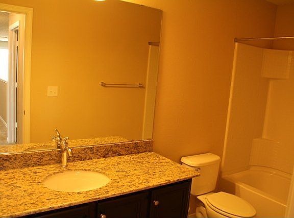Secondary bath with granite counter tops