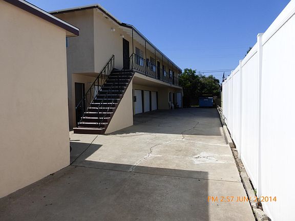 LAUNDRY ROOM=1ST DOOR AT THE BASE OF THE STEPS.