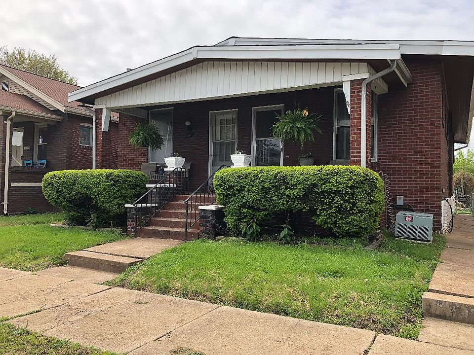 View of covered front porch, shared with duplex neighbor.