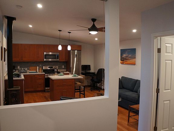 View to main living space from inside bedroom. Leave cellul