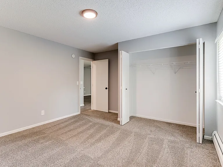 Bedroom, Window, & Closet | White Pines Apartments | Shakopee MN